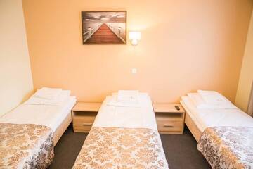 Фото номера Стандартный трехместный номер Отель Ankur Hotell г. Муствеэ 12